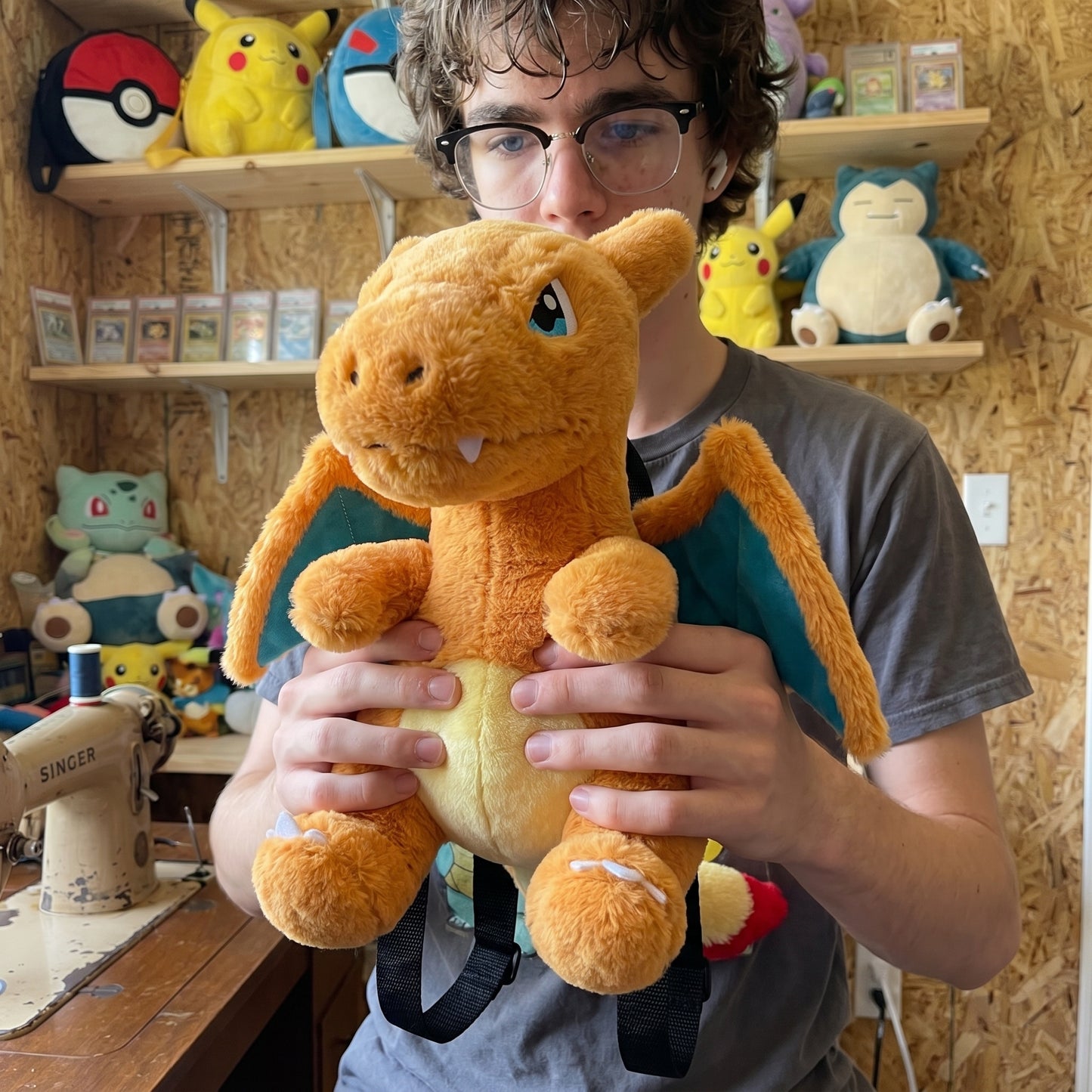 Charizard plush bag held in hands